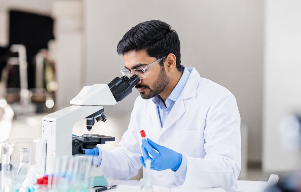 Clinician reviewing samples in a laboratory